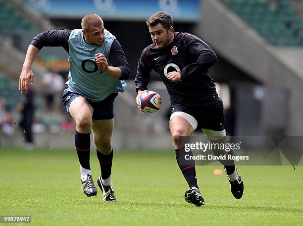 Nick Easter races away from Dave Attwood during an England training session held at Twickenham on May 18, 2010 in Twickenham, England.