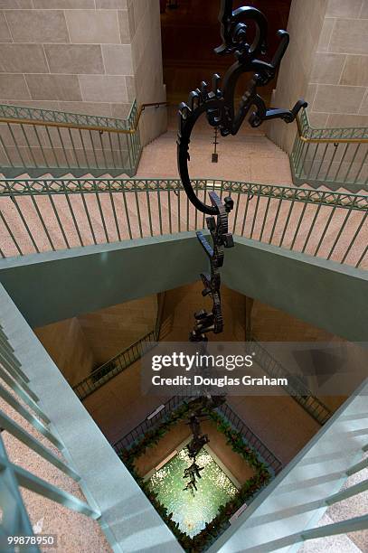 Monkeys Grasping for the Moon, a suspended sculpture designed specifically for the Sackler Gallery, was created by expatriate Chinese artist Xu Bing...