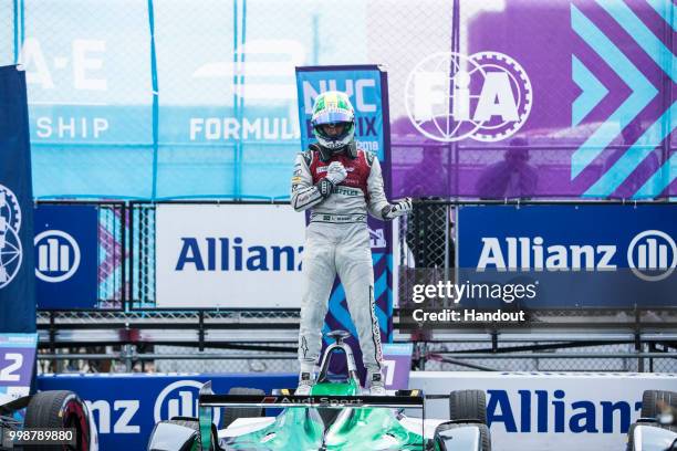 In this handout provided by FIA Formula E, Lucas Di Grassi , Audi Sport ABT Schaeffler, Audi e-tron FE04, celebrates in Parc Ferme after winning the...