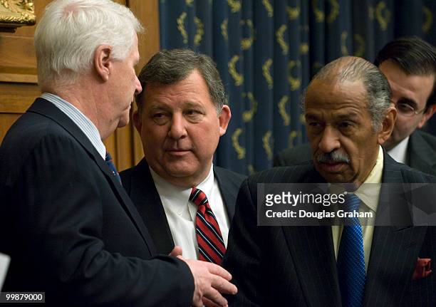 William Delahunt, D-MA., Chris Cannon, R-UT and John Conyers, D-MI., talk after the Subcommittee on Commercial and Administrative Law Subcommittee...