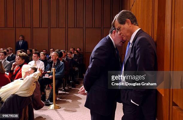 Trent Lott, R-Miss., talks with a staffer during the Senate Finance Committee, full committee hearing on John Snow to be secretary of the Treasury...