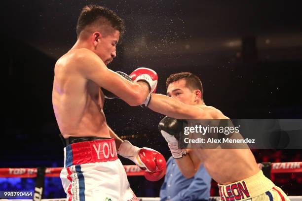 Erick DeLeon lands a shot to the face of Adrian Young during the Regis Prograis v Juan Jose Velasco ESPN boxing match at the UNO Lakefront Arena on...