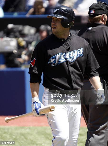 Aaron Hill of the Toronto Blue Jays walks to first to bat against the Texas Rangers during a MLB game at the Rogers Centre on May 16, 2010 in...