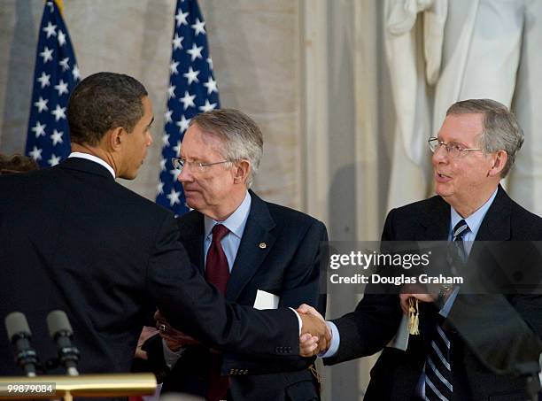 President Barack Obama, Harry Reis, D-HV., and Mitch McConnell, R-KY., during the tribute in celebration of the Bicentennial of Abraham Lincoln's...