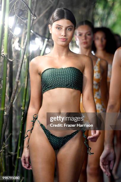 Models walk the runway for Stone Fox Swim Fall 2018 during the Paraiso Fashion Fair at Nautilus Hotel on July 14, 2018 in Miami Beach, Florida.