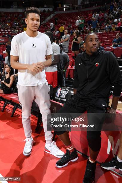 Kevin Knox of the New York Knicks talks to Bam Adebayo of the Miami Heat before the game against the Boston Celtics during the 2018 Las Vegas Summer...