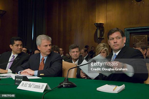 Former U.S. Attorneys David Iglesias and John McKay look on as Bud Cummins hands over the e-mail he sent warning the other U.S. Attorneys about...