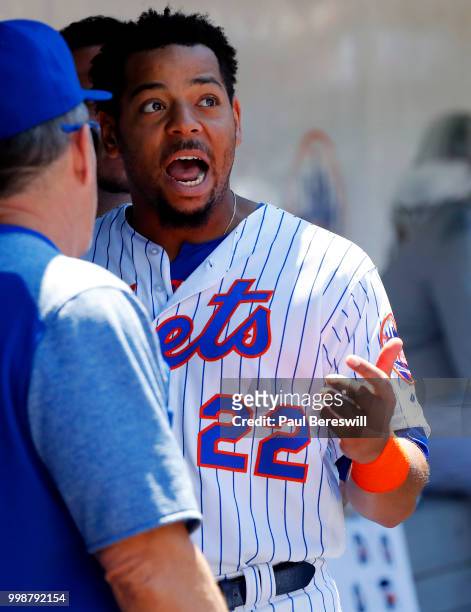Dominic Smith of the New York Mets talks in the dugout during an interleague MLB baseball game against the Tampa Bay Rays on July 8, 2018 at Citi...