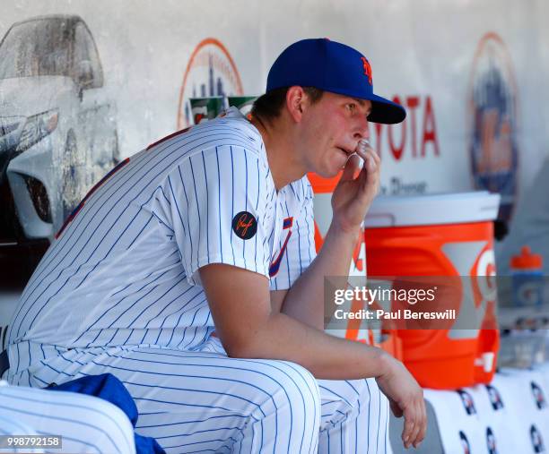 Pitcher Chris Flexen reacts in the dugout during an interleague MLB baseball game against the Tampa Bay Rays on July 8, 2018 at Citi Field in the...