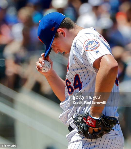 Pitcher Chris Flexen reacts in an interleague MLB baseball game against the Tampa Bay Rays on July 8, 2018 at Citi Field in the Queens borough of New...