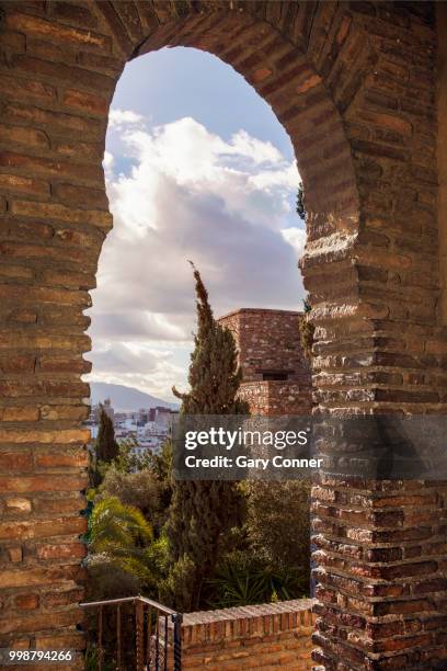 view through doorway, alcazaba malaga - alcazaba of málaga stock pictures, royalty-free photos & images