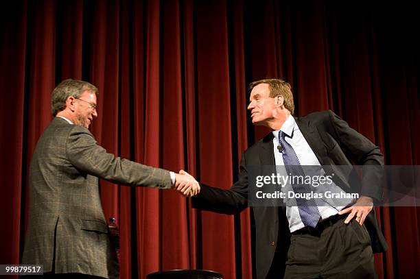 Former Governor of Virginia Mark Warner greets Eric E. Schmidt the CEO of Google during a town hall meeting in downtown Blacksburg Virginia at the...