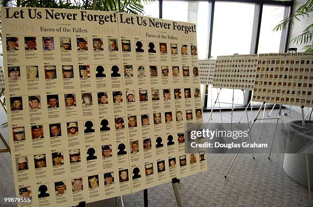 Pictures of some of the 2000 plus U.S. Servicemen killed in Iraq. The display called "Let Us never Forget; Faces of the Fallen" is outside Frank...