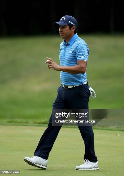 Andres Romero of Argentina reacts after a shot on the 15th hole during the third round of the John Deere Classic at TPC Deere Run on July 14, 2018 in...