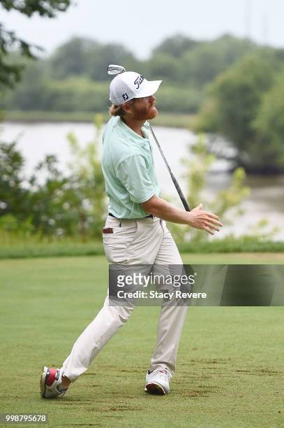Derek Fathauer watches his tee shot on the 16th hole during the third round of the John Deere Classic at TPC Deere Run on July 14, 2018 in Silvis,...
