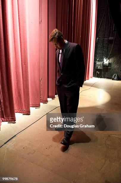 Former Governor of Virginia Mark Warner gathers his thoughts back stage before the start of a town hall meeting in downtown Blacksburg Virginia at...