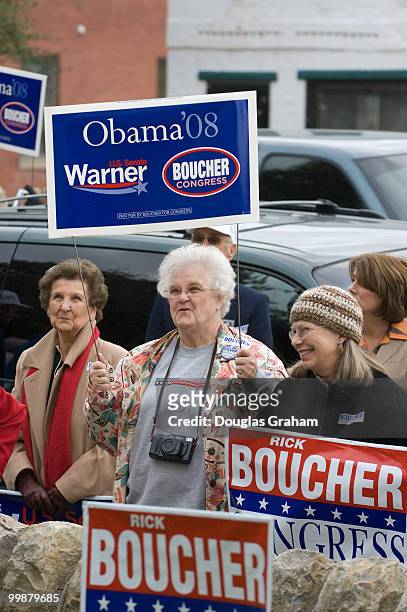 People holds signs during democratic rally and meet and greet for Mark Warner and Rick Boucher, D-VA., at the Wise County Courthouse in downtown Wise...