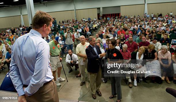 Senator Mark Warner, D-VA., answers questions about health care during a Town Hall meeting at the Fredericksburg Expo & Conference Center in...