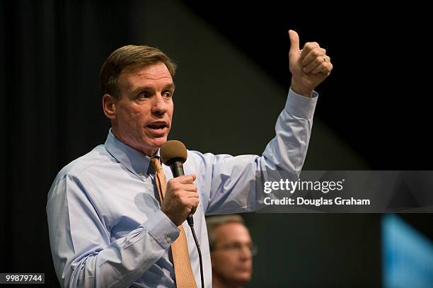 Senator Mark Warner, D-VA., answers questions about health care during a Town Hall meeting at the Fredericksburg Expo & Conference Center in...