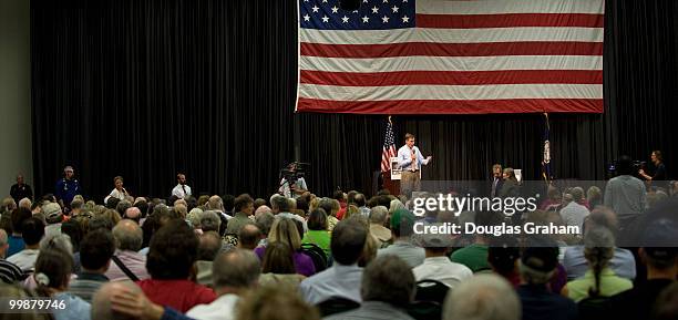 Senator Mark Warner, D-VA., answers questions about health care during a Town Hall meeting at the Fredericksburg Expo & Conference Center in...