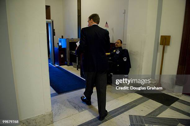 Senator Mark Warner, D-VA., leaves his office in the Russell Senate Office Building following passage of the health care reform bill on Thursday...