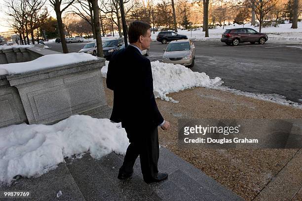 Senator Mark Warner, D-VA., leaves his office in the Russell Senate Office Building following passage of the health care reform bill on Thursday...