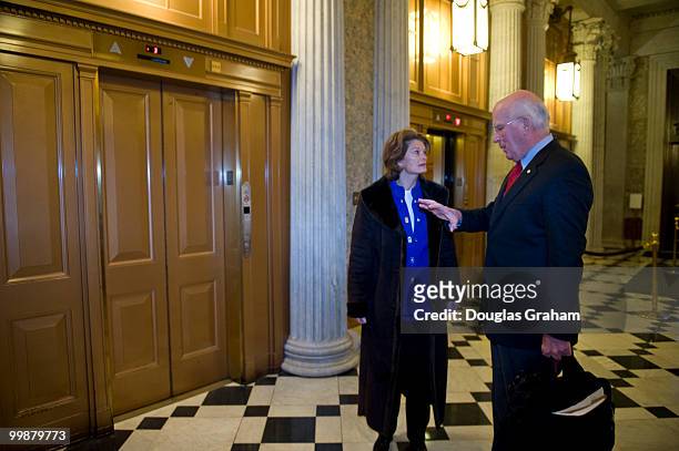 Lisa Murkowski, R-AK., and Pat Leahy, D-VT., talk outside the Senate chamber before the 7a.m. Finial passage vote of the health care reform bill on...