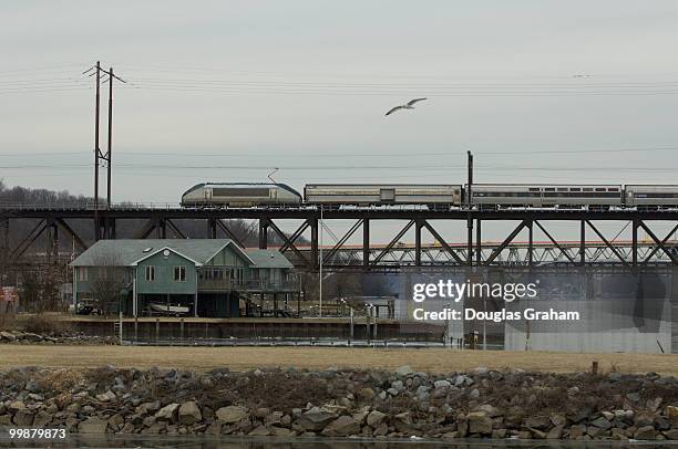 Amtrak train train crosses the historic bridge over the Susquehanna River at Havre de Grace, Maryland on January 17, 2009.