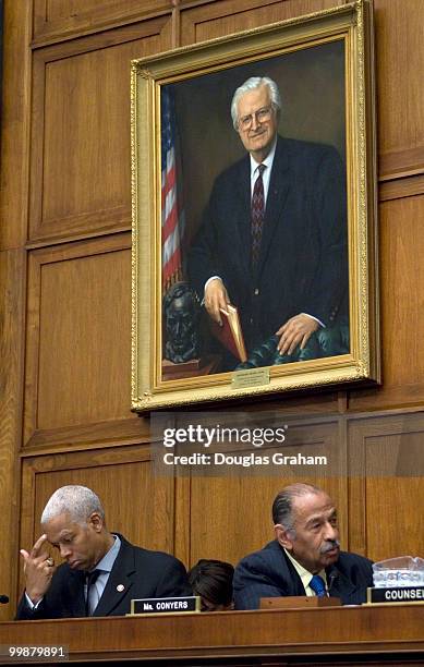 Hank Johnson, D-GA and John Conyers, D-MI., listen to testimony during the Subcommittee on Commercial and Administrative Law Subcommittee Meeting to...