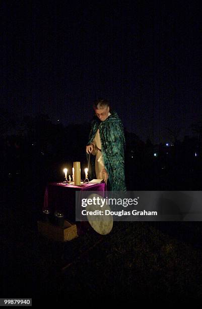 Issaac Bonewits stands at the alter during the traditional full moon celebration that attracted about 85 to 100 participants to the Jefferson Memoral...