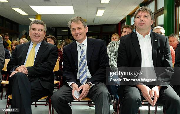 Thomas Bach, head of German Sports Association, Wolfgang Vockel, mayor of Tauberbischofsheim and Ronny Zimmermann of Football Association Baden...