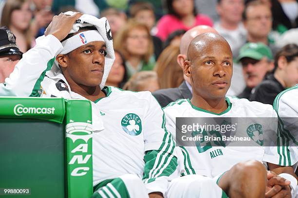 Rajon Rondo and Ray Allen of the Boston Celtics watch from the bench during the game against the Indiana Pacers on March 12, 2010 at the TD Garden in...