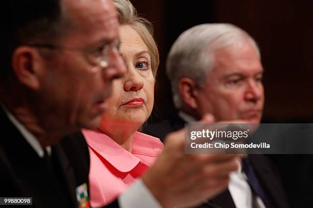 Secretary of State Hillary Clinton listens to Chairman of the Joint Chiefs of Staff Admiral Michael Mullen testify before the Senate Foreign...