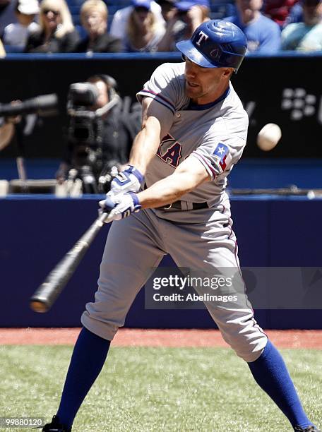 David Murphy of the Texas Rangers swings for a pitch against the Toronto Blue Jays during a MLB game at the Rogers Centre on May 16, 2010 in Toronto,...