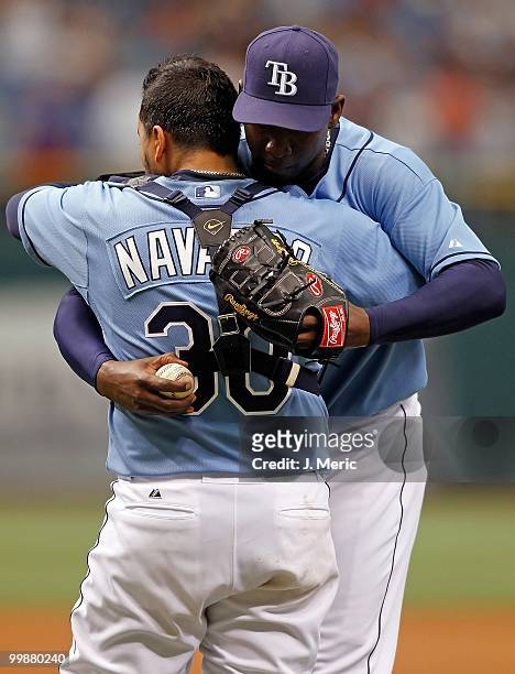 Catcher Dioner Navarro and pitcher Rafael Soriano of the Tampa Bay Rays embrace just after the game against the Seattle Mariners at Tropicana Field...
