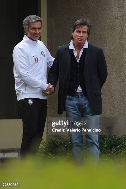 Internazionale Milano head coach Jose Mourinho and Gabriele Oriali attend an FC Internazionale Milano training session during a media open day on May...