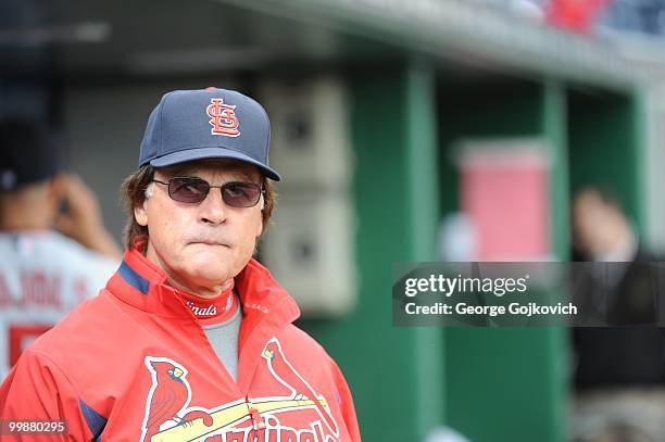 Manager Tony La Russa of the St. Louis Cardinals looks on from the dugout before a game against the Pittsburgh Pirates at PNC Park on May 9, 2010 in...