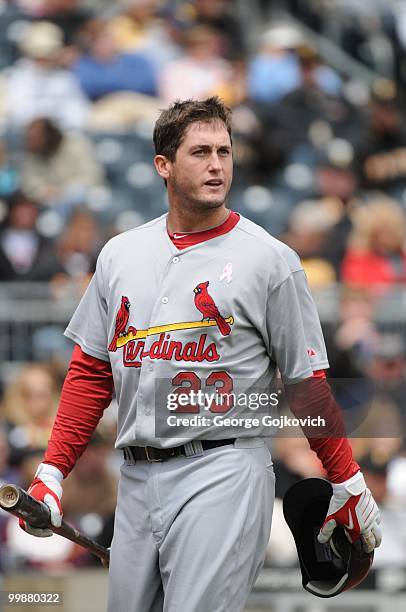 Third baseman David Freese of the St. Louis Cardinals walks back to the dugout after batting during a game against the Pittsburgh Pirates at PNC Park...