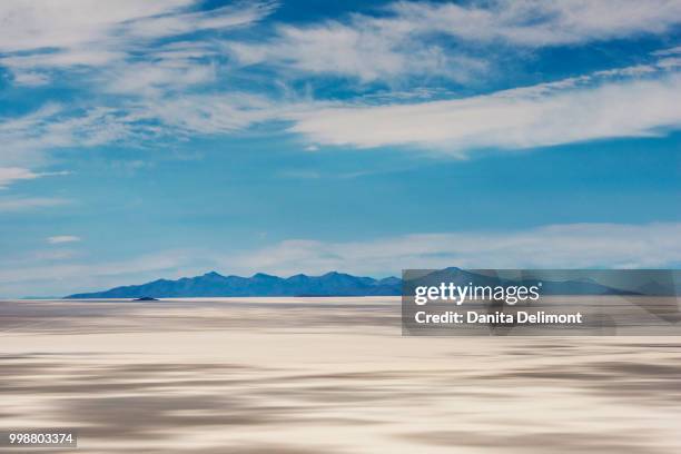 blue sky over salar de uyuni, bolivia - salar stock pictures, royalty-free photos & images