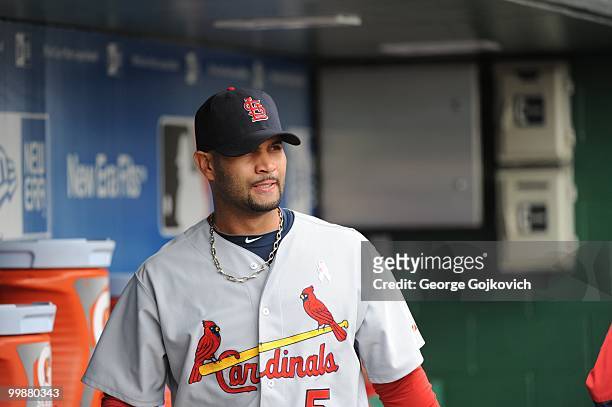 First baseman Albert Pujols of the St. Louis Cardinals looks on from the dugout before a game against the Pittsburgh Pirates at PNC Park on May 9,...
