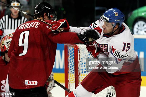 Steve Downie of Canada fights with Jan Marek of Czech Republic during the IIHF World Championship group F qualification round match between Canada...