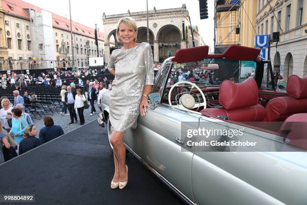 Uschi Glas near by a Mercedes oldtimer during the Mercedes-Benz reception at 'Klassik am Odeonsplatz' on July 14, 2018 in Munich, Germany.