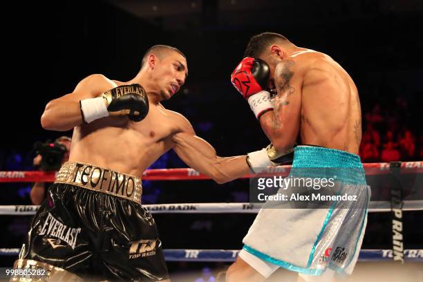 Teofimo Lopez punches William Silva during their WBC Continental Americas Title boxing match at the UNO Lakefront Arena on July 14, 2018 in New...