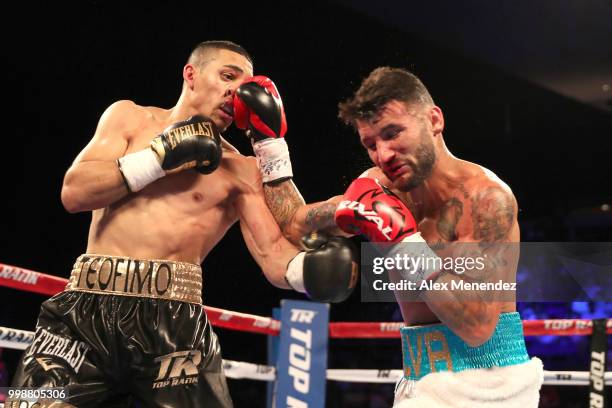 Teofimo Lopez and William Silva exchange blows during their WBC Continental Americas Title boxing match at the UNO Lakefront Arena on July 14, 2018...