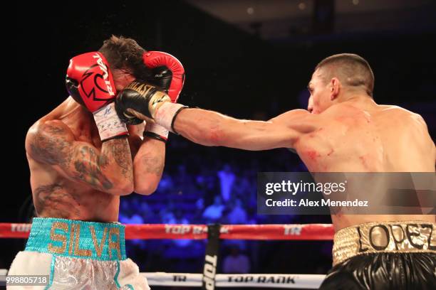 Teofimo Lopez lands a straight left to the face of William Silva during their WBC Continental Americas Title boxing match at the UNO Lakefront Arena...