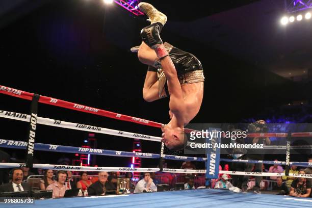 Teofimo Lopez backflips into the air after beating William Silva during their WBC Continental Americas Title boxing match at the UNO Lakefront Arena...