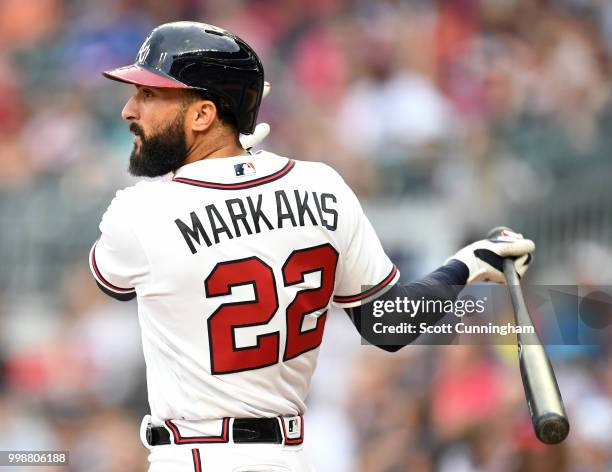 Nick Markakis of the Atlanta Braves hits a ninth inning single against the Arizona Diamondbacks at SunTrust Park on July 14, 2018 in Atlanta, Georgia.