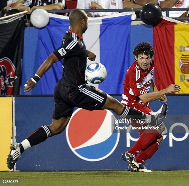 Heath Pearce of FC Dallas defends the ball against Julius James of D.C. United at Pizza Hut Park on May 8, 2010 in Frisco, Texas.