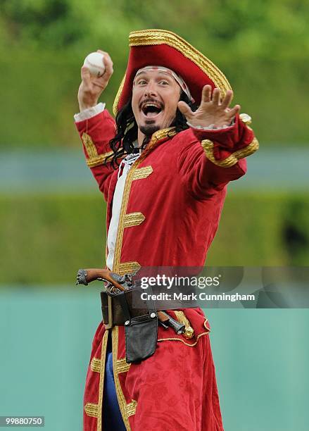 Captain Morgan throws out the ceremonial first pitch during the Captain Morgan First Pitch Tour before the baseball game between the Detroit Tigers...