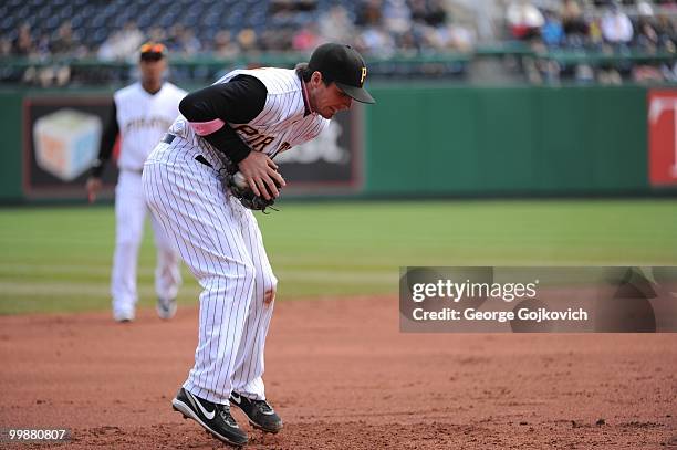 Third baseman Andy LaRoche of the Pittsburgh Pirates catches a batted ball during a game against the St. Louis Cardinals at PNC Park on May 9, 2010...